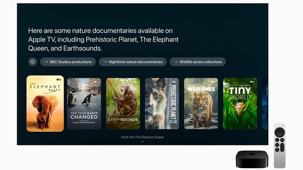 Apple TV box and silver remote beside a television displaying a conversational recommendation for nature documentaries, with cover art for The Elephant Queen, The Year Earth Changed, Earthsounds, Prehistoric Planet: Ice Age, The Wild Ones, and Tiny World.