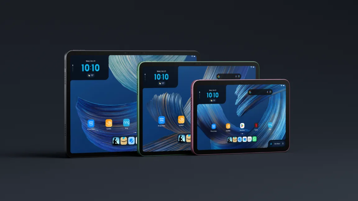 Three overlapping tablets in black, green, and pink frames on a dark background, displaying blue abstract wallpapers, clock widgets, and app icons. The front tablet shows Google search, Play Store, Amazon apps, and an Ask Alexa control.